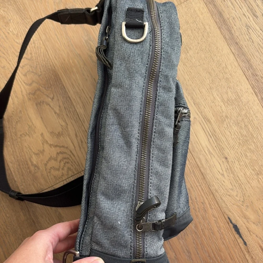 Tumi one strap demin backpack